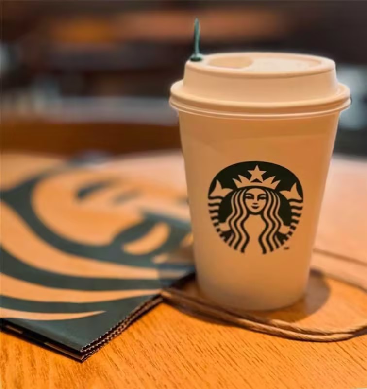 Starbucks large food retail AI internal service - Starbucks coffee cup